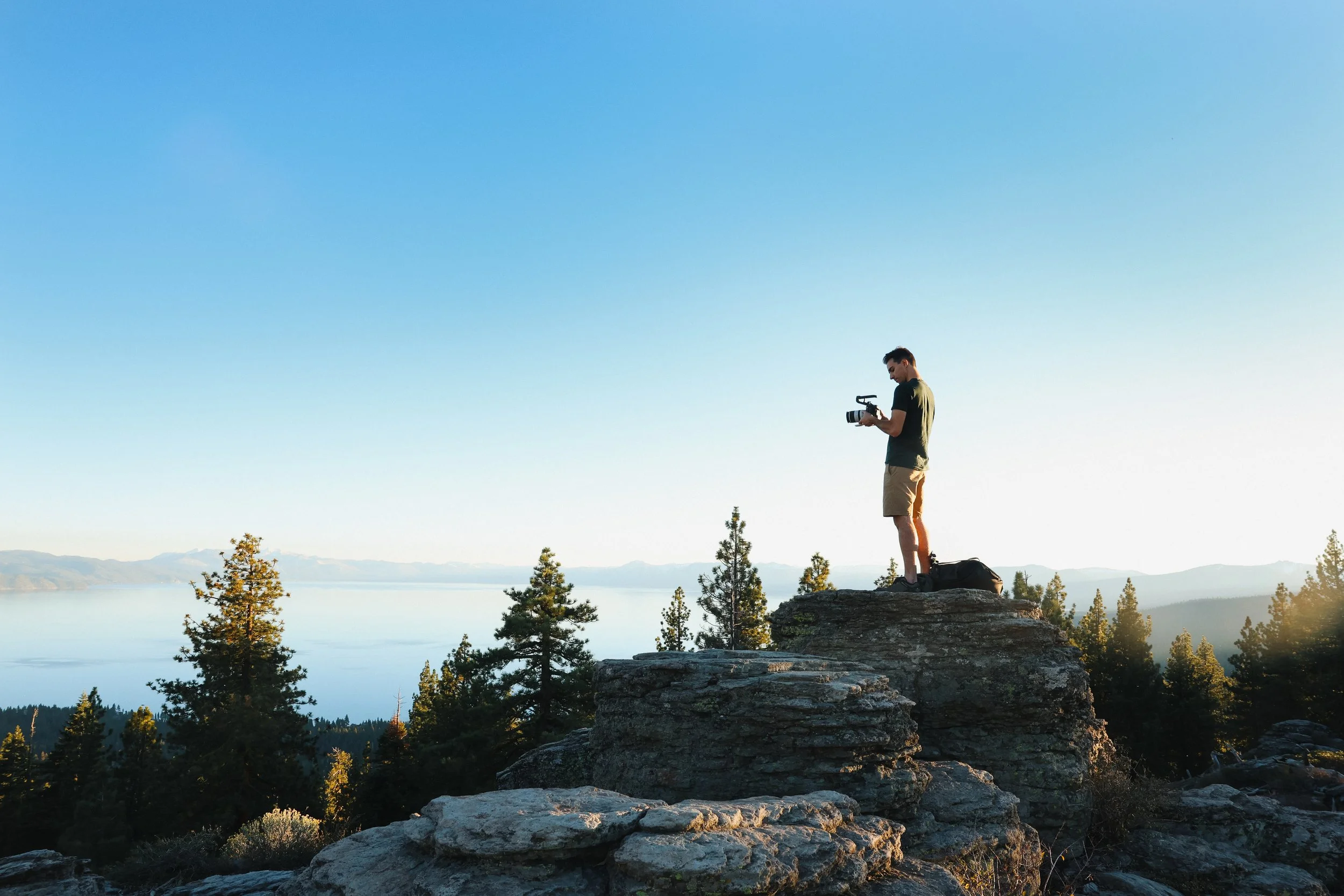 Lake Tahoe shoreline with pines and granite shore